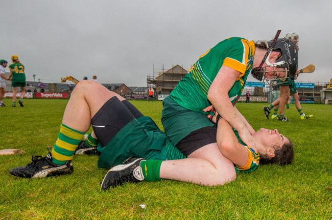 Emma and Claire Coffey celebrate after the game