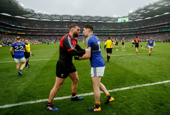 Aidan O’Shea exchanges words with Paul Geaney