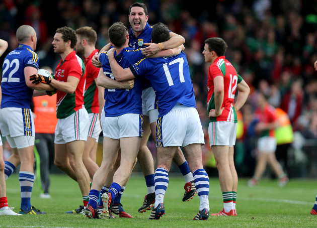 Bryan Sheehan, Kieran O'Leary and Declan O'Sullivan celebrate at the end of the game