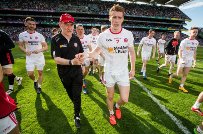 Mickey Harte celebrates with Peter Harte after the game