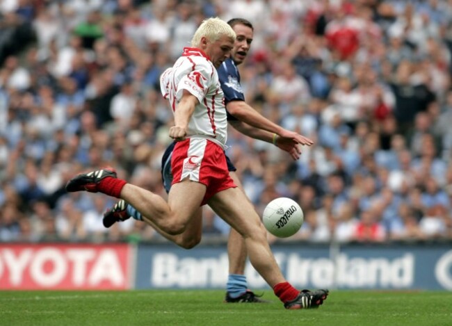 Owen Mulligan shoots to score a goal