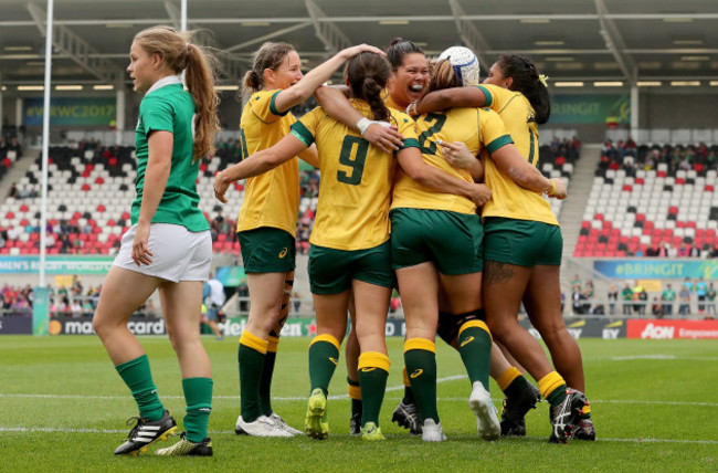 Cheyenne Campbell celebrates scoring their first try with teammates