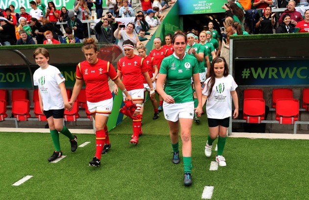 Nora Stapleton leads the Ireland team out on her 50th cap