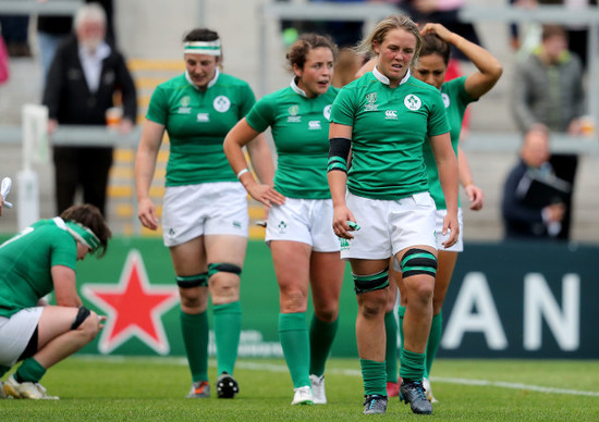 Ireland players dejected after Wales score a try