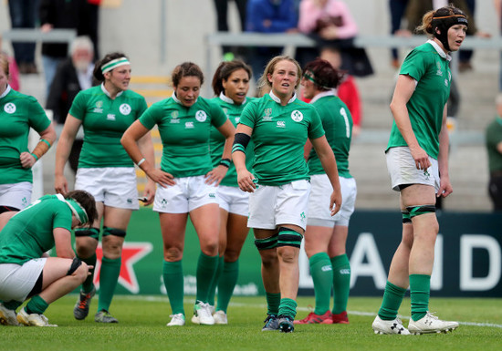 Ireland players dejected after Wales score a try