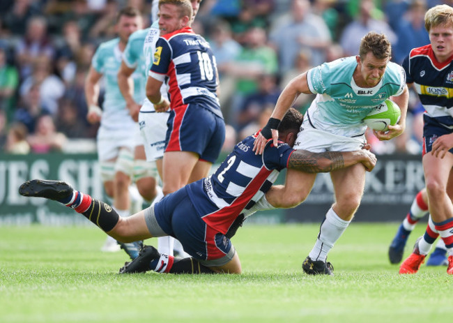 Mat Healy is tacked by Tusi Pisi