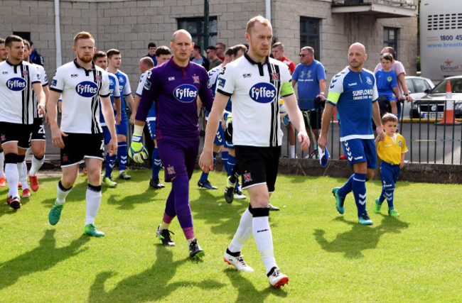 Chris Shields leads his side out