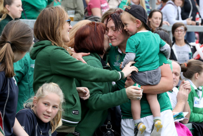 Lindsay Peat with her son Barra after the game