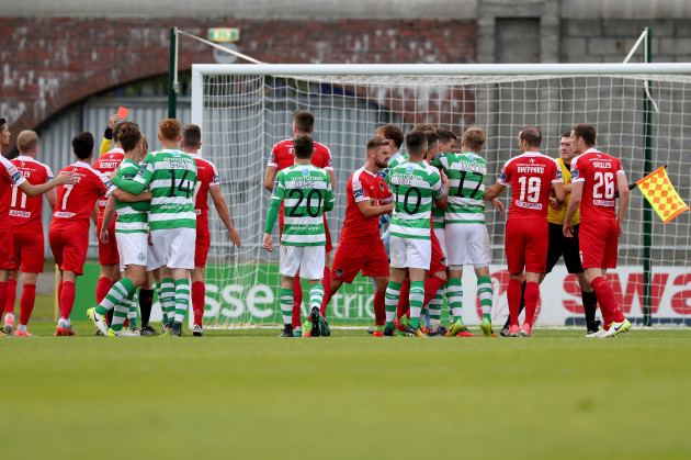 A scuffle breaks out between Shamrock Rovers players and Cork City players
