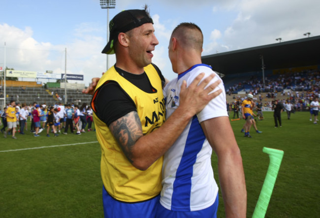 Dan Shanahan congratulates brother Maurice Shanahan at the end of the game