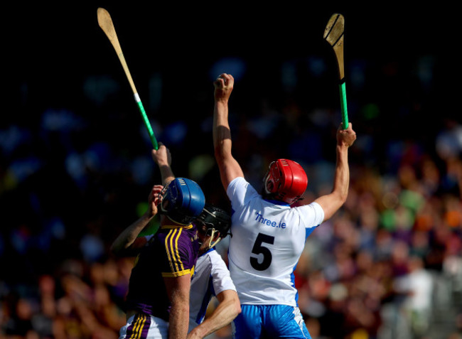 Jack Guiney with Barry Coughlan and Tadhg De Burca