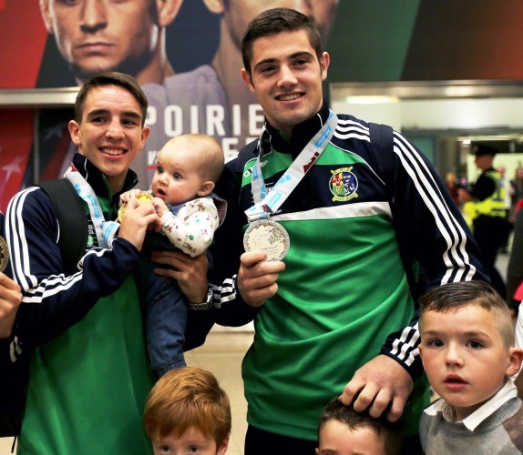 Michael O'Reilly with his son MJ, Michael Conlan with his daughter Luisne and Joe Ward