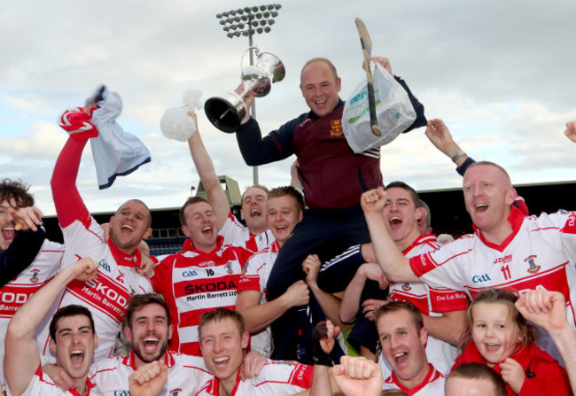 Derek McGrath celebrates with his team