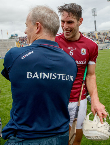 Michael Donoghue celebrates with Gearoid McInerney