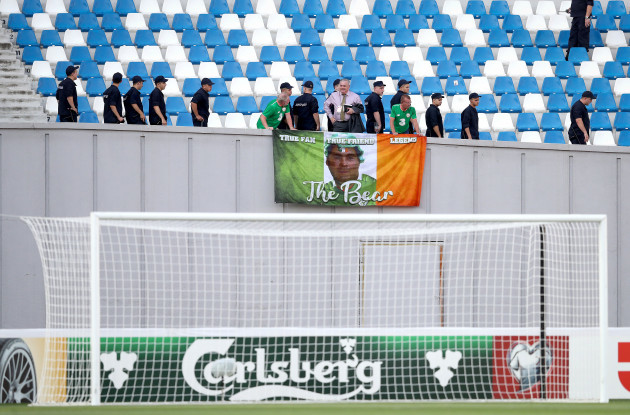 Ireland fans set up flags