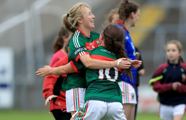 Marie Corbett and Doireann Hughes celebrate at the end of the game