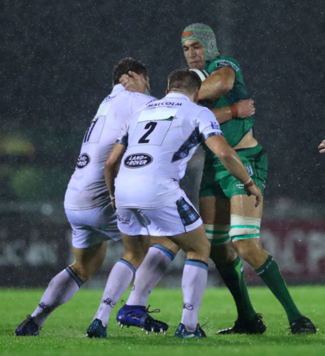 Ultan Dillane is tackled by Oli Kebble and George Turner