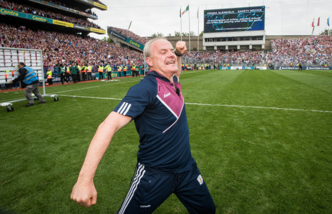 Michael Donoghue celebrates at the final whistle