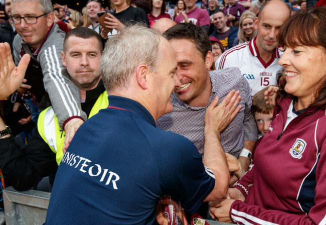 Michael Donoghue celebrates with Alan Kerins