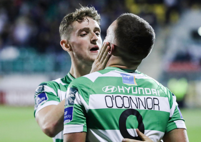 Michael O’Connor celebrates scoring a goal with Lee Grace