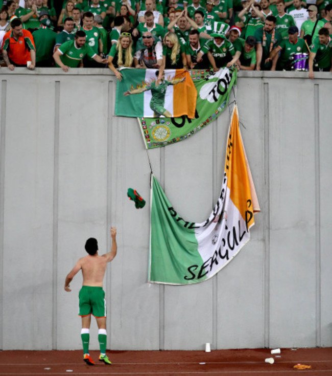 Shane Long throws his jersey into the crowd