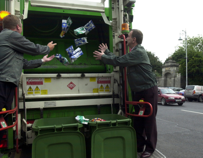 MARTIN CULLEN RUBBISH REFUGE WHEELIE BINS COLLECTIONS WASTE DUMP SITE SCENES ENVIRONMENTAL CRISIS CONCERNS IN IRELAND GREEN ISSUES EMPTY CARTONS