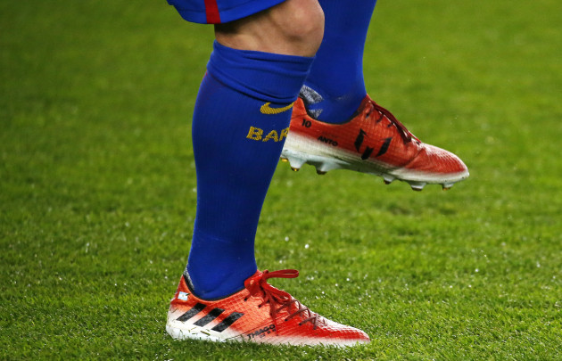 What football boots do Messi, Ronaldo 