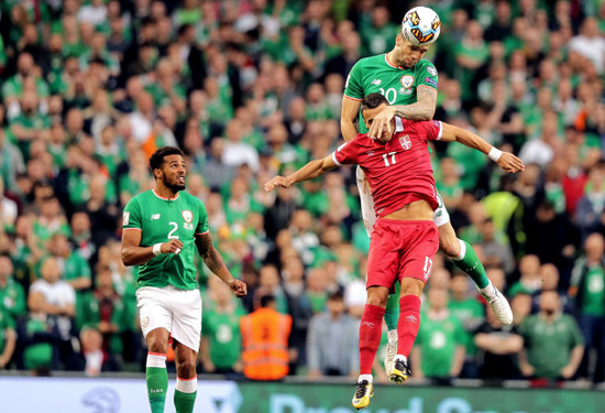 Shane Duffy with Filip Kostic