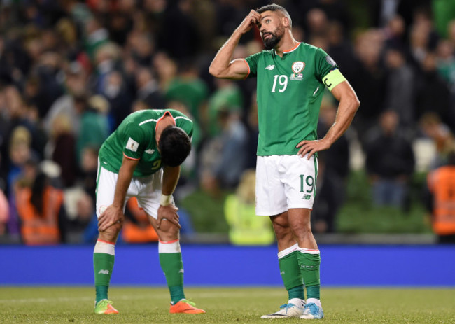 Jonathan Walters and Shane Long dejected after the game