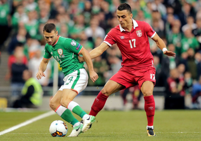 Wes Hoolahan with Filip Kostic