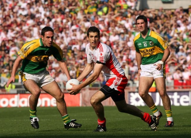 Justin McMahon watched by Declan O'Sullivan and Byran Sheehan