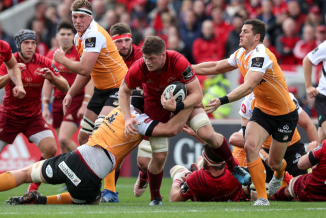 Jack O’Donoghue is tackled by Rynier Bernardo