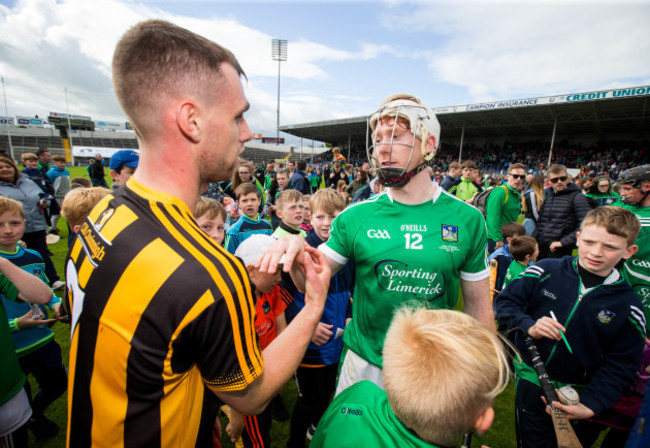 Cian Lynch shakes hands with Sean Morrissey