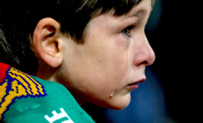 A tearful young Irish fan late in the game