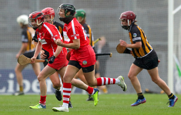 Julia White celebrates scoring the winning point in injury time