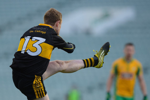 Colm Cooper kicks a point from a free