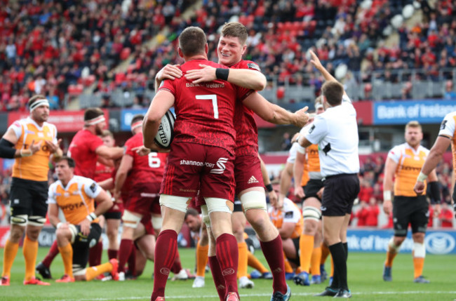 Munster’s Tommy O’Donnell scores a try and is congratulated by Jack O’Donoghue