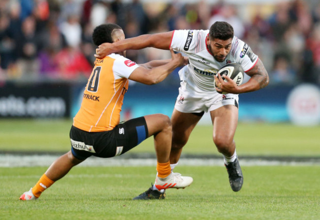 Charles Piutau is tackled by Clayton Blommetjies