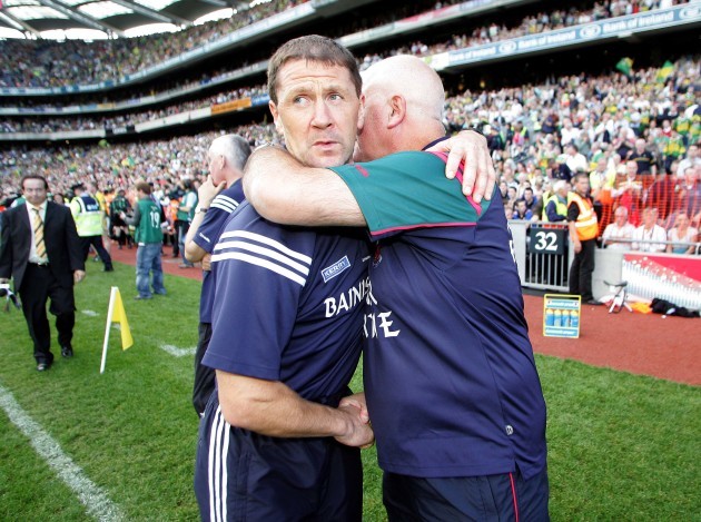 Jack O'Connor is congratulated by John Morrison after the game