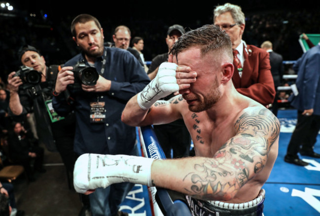 Carl Frampton dejected after losing