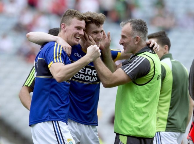 Stephen Wallace celebrates after the game