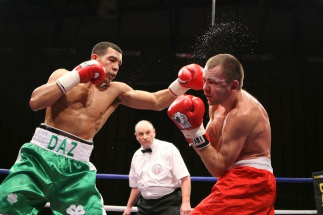 Darren Sutherland lands a punch on Siarhei Navarka