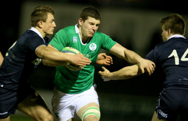 Nick Timoney tackled by Patrick Kelly and Ben Robbins