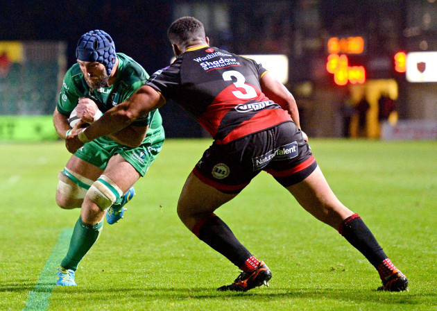 John Muldoon is tackled by Leon Brown