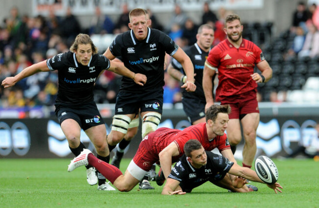 Darren Sweetnam and Tom Habberfield scramble for the loose ball