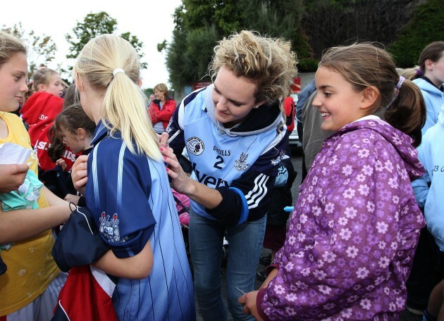 Rachel Ruddy signs autographs for fans