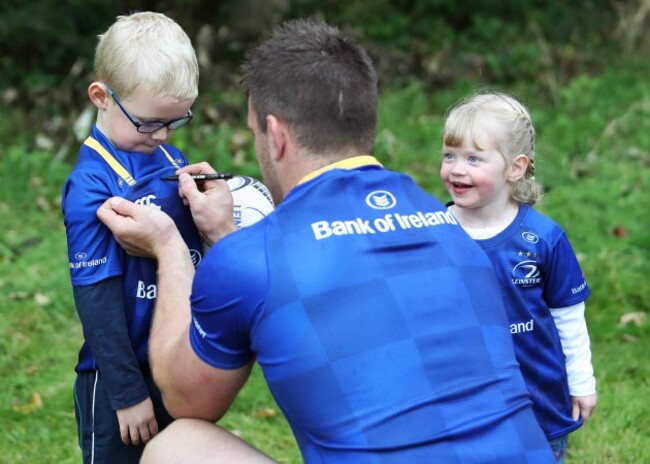 Sean O'Brien signing an autograph for Fionn Kelly