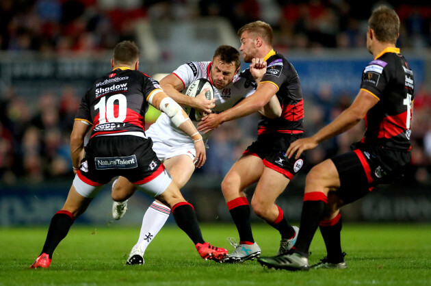 Dorian Jones and Owain Leonard tackle Tommy Bowe