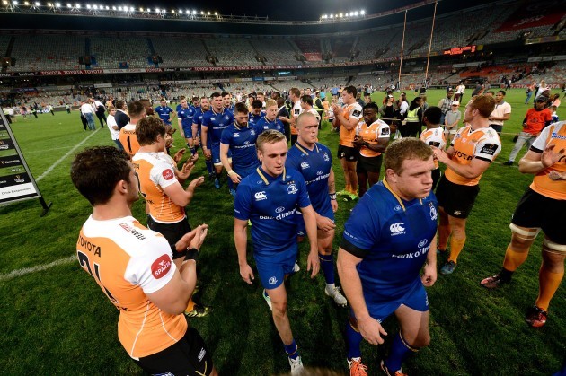 Cheetahs players clap off the Leinster team after the game