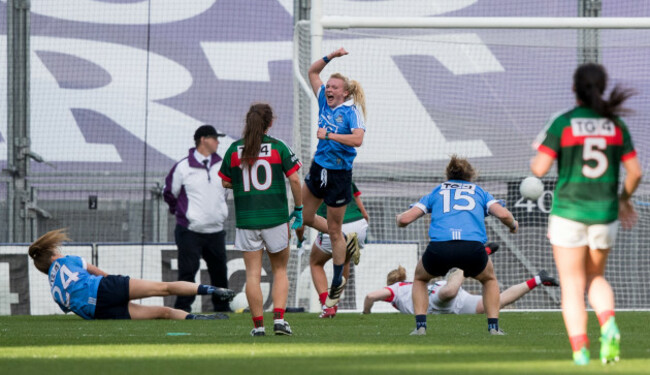 Carla Rowe celebrates scoring a goal
